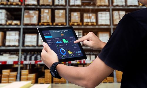 Smart,Warehouse,Management,System.worker,Hands,Holding,Tablet,On,Blurred,Warehouse